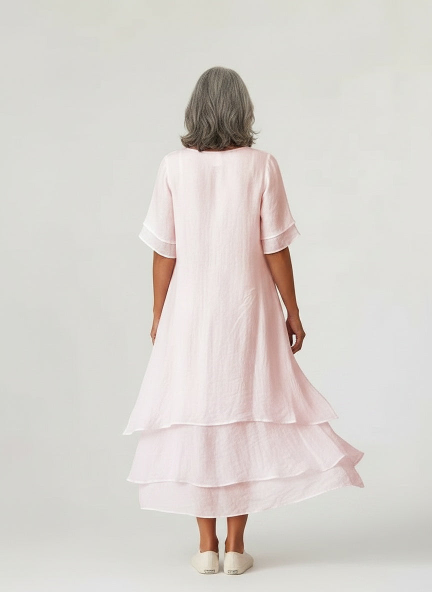 Back pose of the model wearing Vloeiende midi jurk met ruime snit voor dames