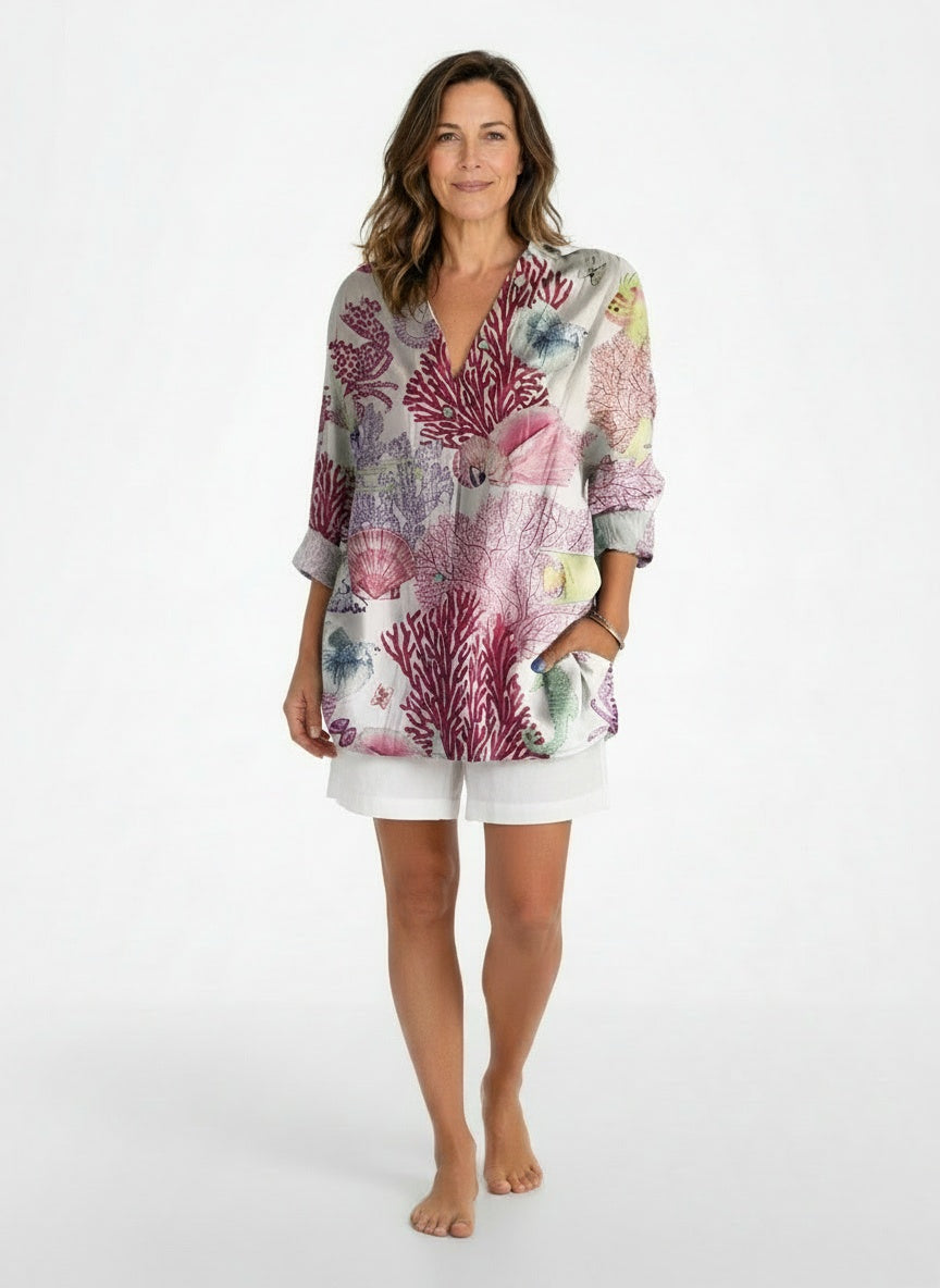 Full body view of the model wearing Elegante knoopblouse met lange mouwen voor dames