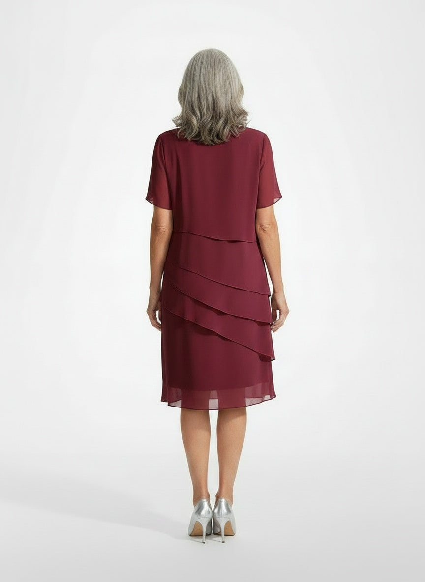 Back pose of the model wearing Midi-jurk van chiffon met volants voor dames