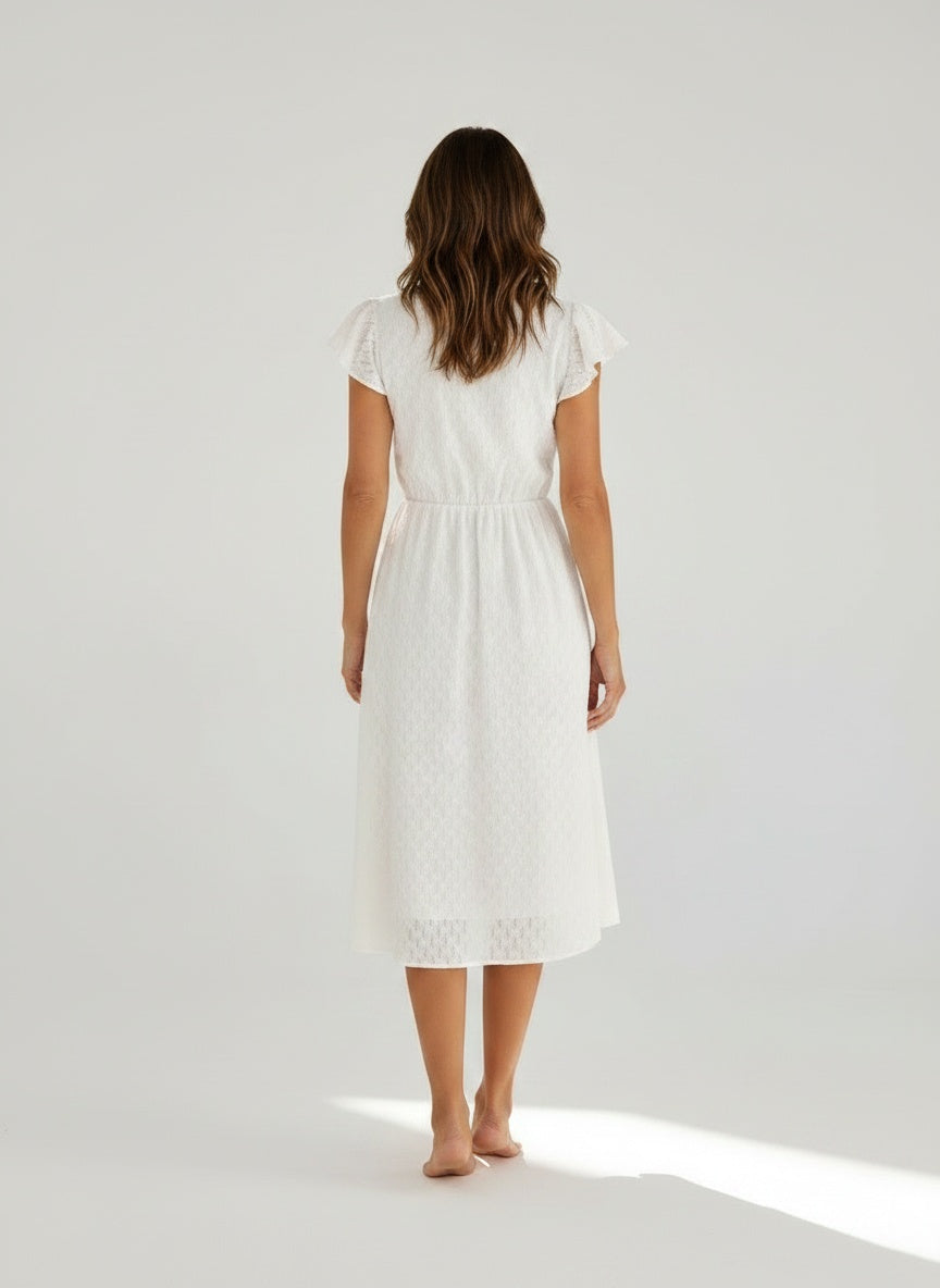 Back pose of the model wearing Midi zomerjurk met korte mouwen en ruffles voor dames