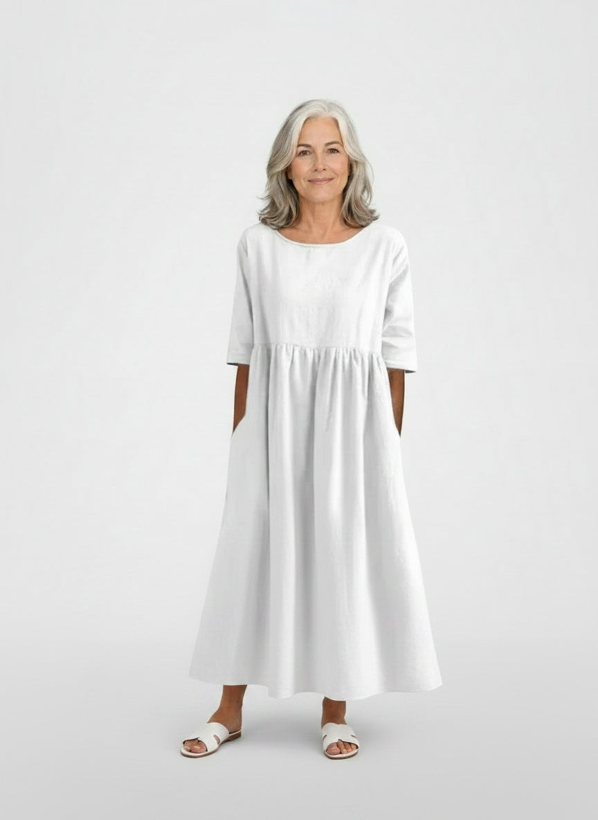 Full body view of the model wearing Zomermidi-jurk met een casual snit voor vrouwen