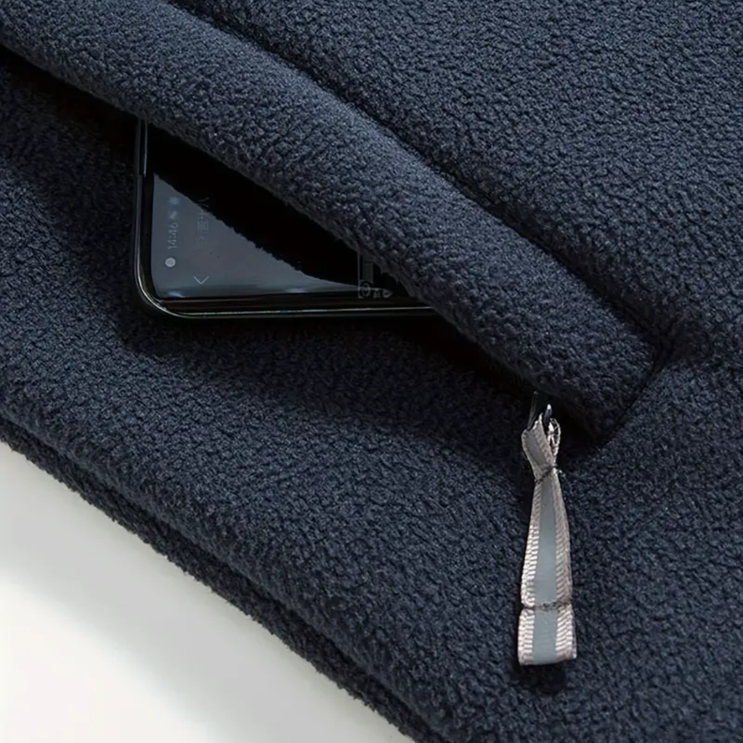 Gilet polaire homme sans manches à col montant et poches zippées 7