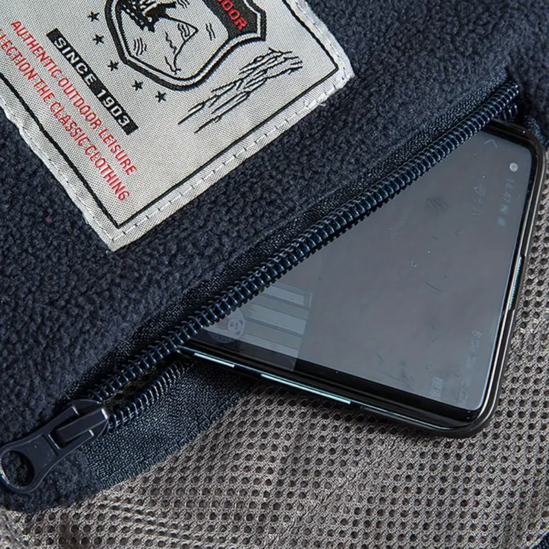 Gilet polaire homme sans manches à col montant et poches zippées 8