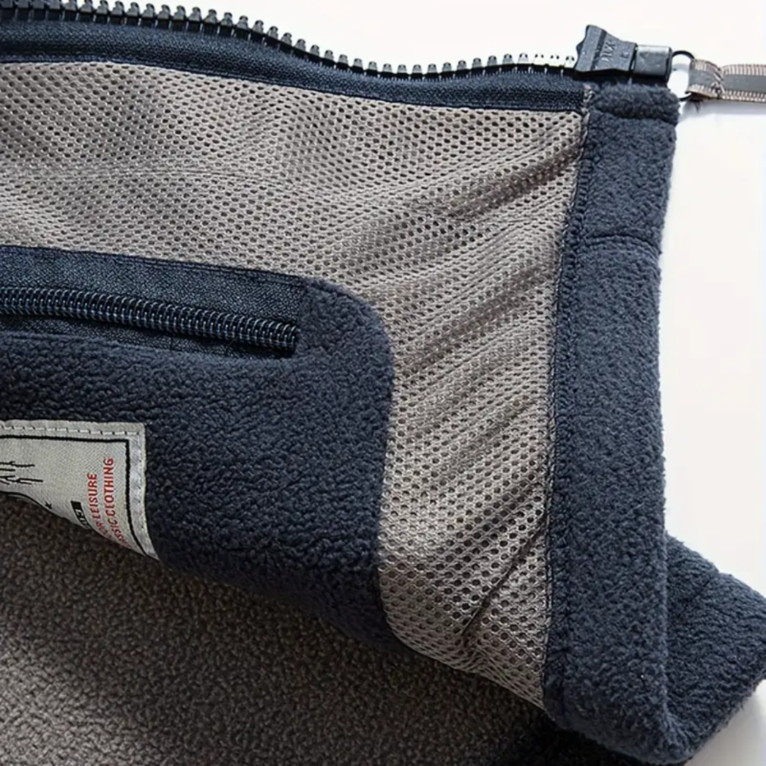 Gilet polaire homme sans manches à col montant et poches zippées 9