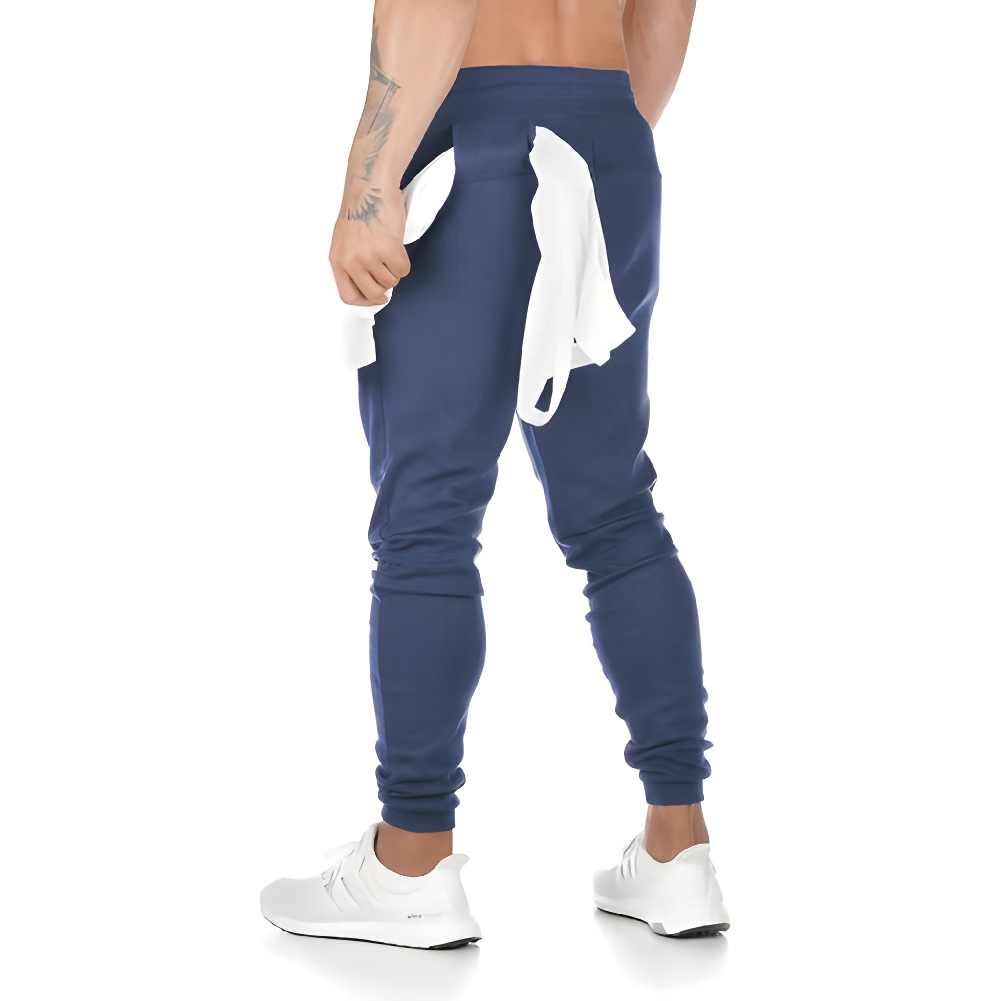 Jogging homme sportif fuselé à poches zippées 2
