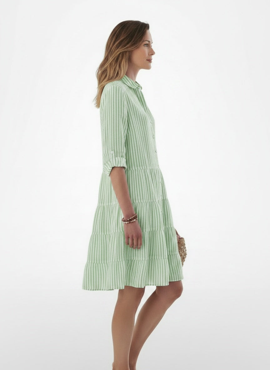 Side profile of the model wearing Midi zomerjurk met strepen voor dames