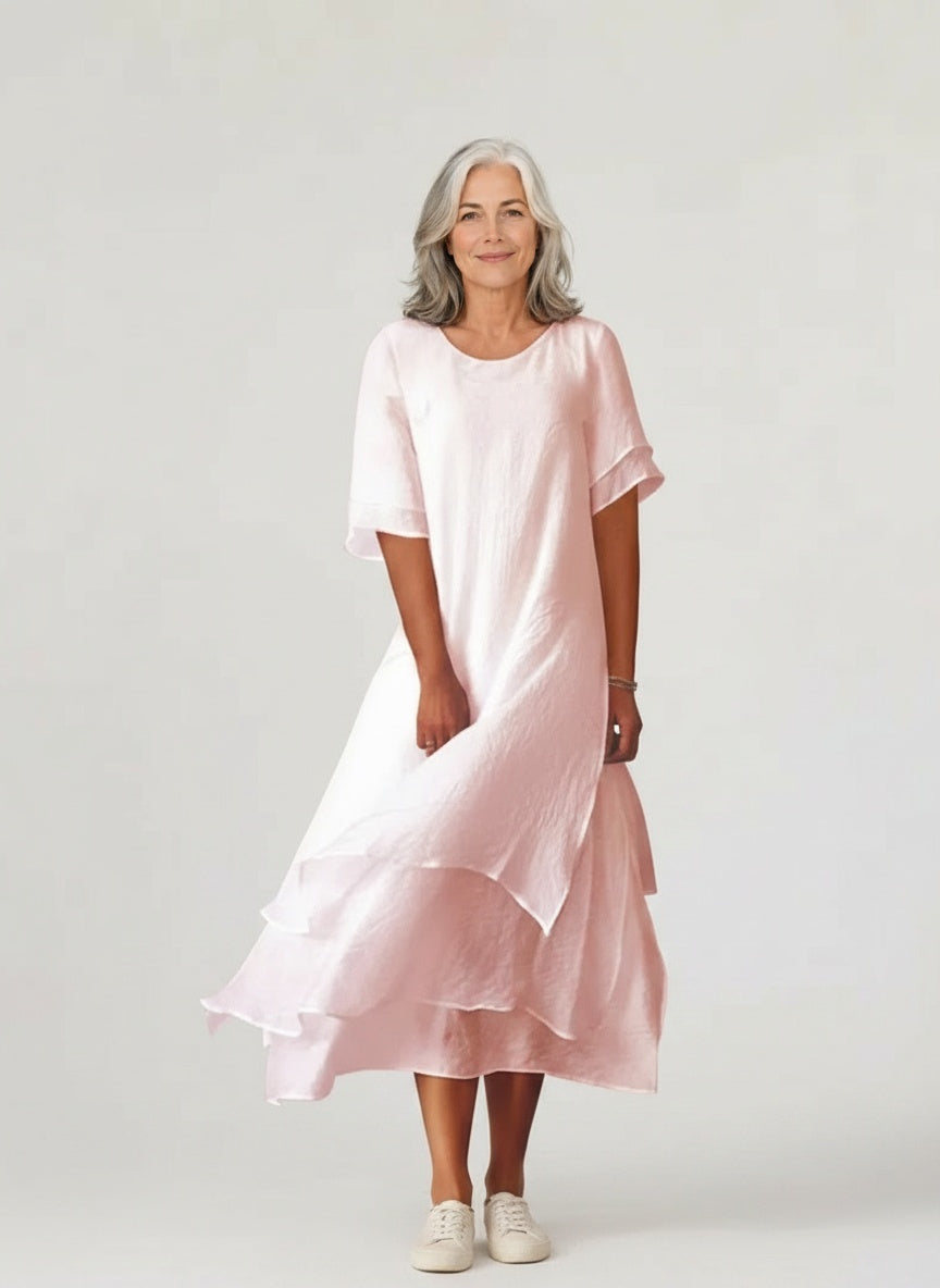 Full body view of the model wearing Vloeiende midi jurk met ruime snit voor dames